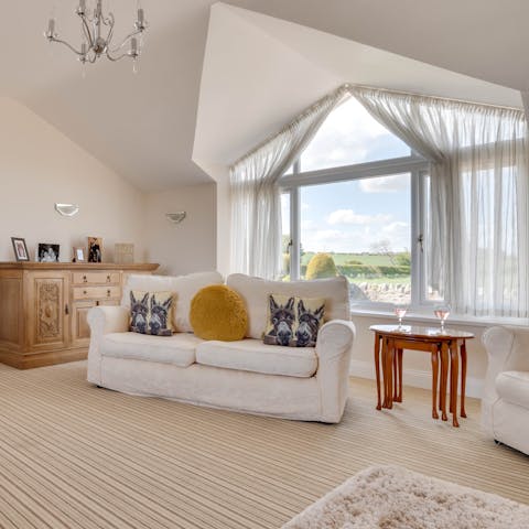 Gaze out at the Northumberland countryside from the sun room's vast window