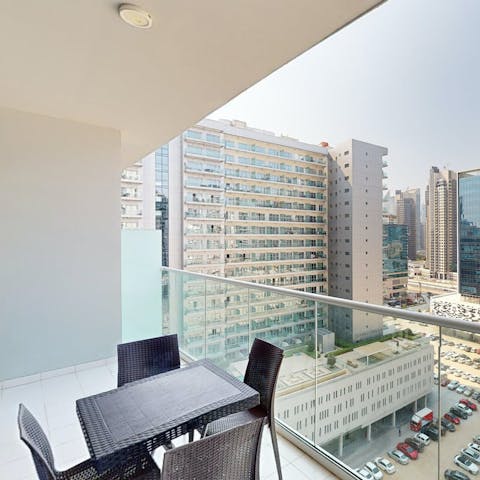 Enjoy an alfresco glass of karak out on the private balcony