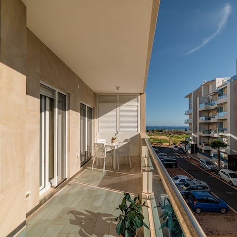 Start mornings with pastries and espressos on the private balcony with its sea views