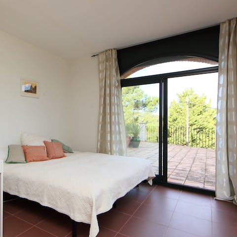 Step right out to one of the balconies from the zen-like bedroom