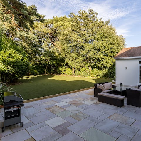 Relax in the expansive garden, patio and barbecue area