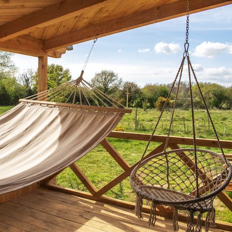 Spot the local wildlife in the meadow from the hammock or swing seat