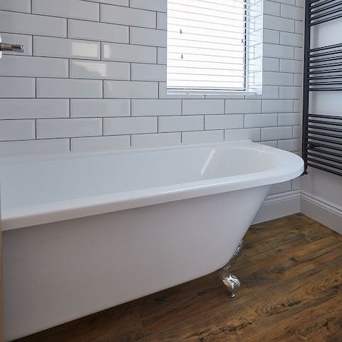 Soak your worries away in the elegant clawfoot bathtub