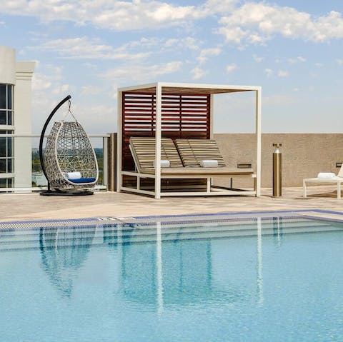 Cool off from the Floridian heat with a dip in the communal rooftop pool
