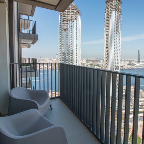 Relax on your private balcony and take in the stunning city views 