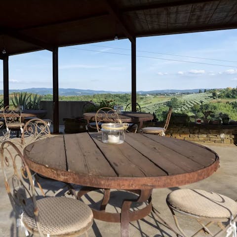 Dine in Italian alfresco style on the shaded terrace with views of the garden