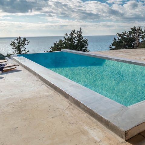 Admire views of the Ionian Sea from the infinity pool