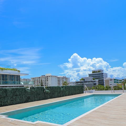 Top up your tan at the communal rooftop pool 