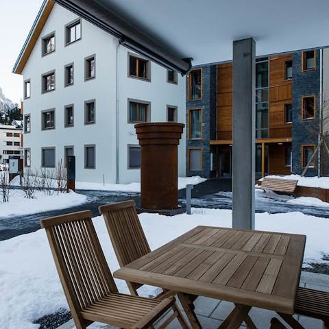 Sit out with a warm drink on the snowy terrace