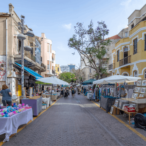 Admire the work of local artisans from Nachalat Binyamin Market