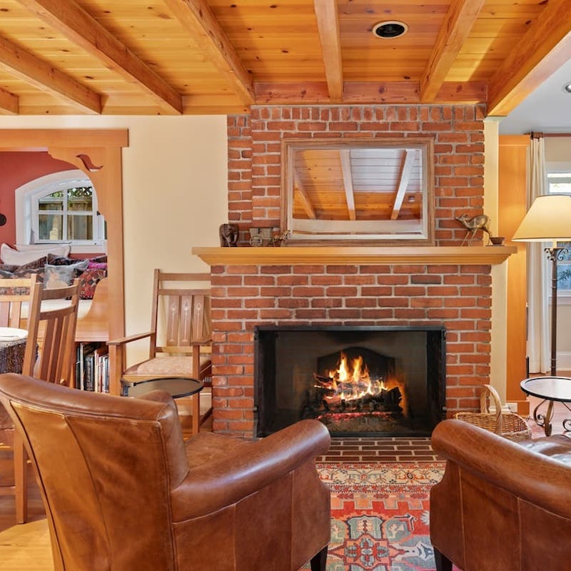 Pour yourself a nightcap and get cosy by the fireplace