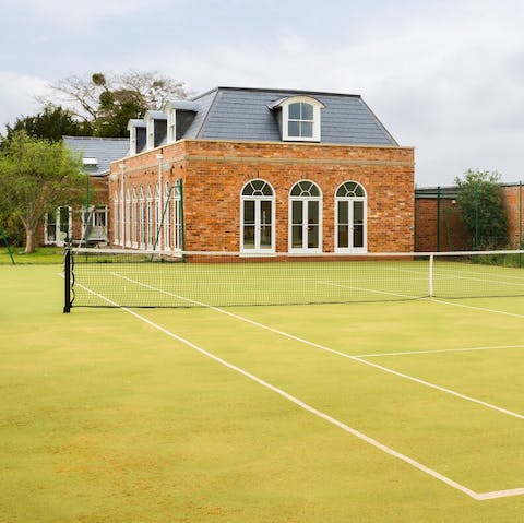 Play a game on the versatile astro turf  – it's set up as a tennis court in the summer and a football pitch in the winter