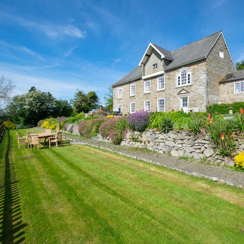 Take breakfast out into the spacious gardens and enjoy it alfresco