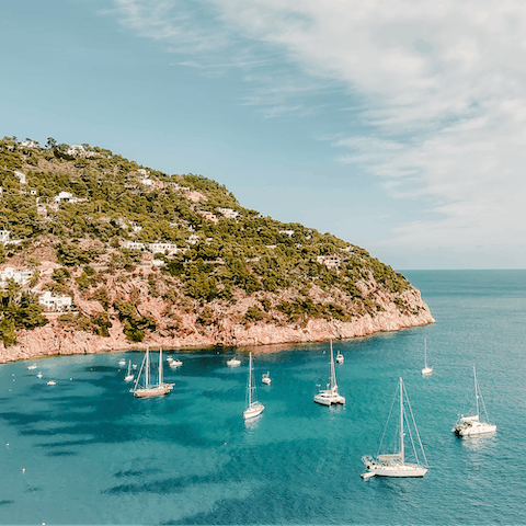 Spend the day on the idyllic waters of Cala Bassa beach – a thirteen-minute drive away