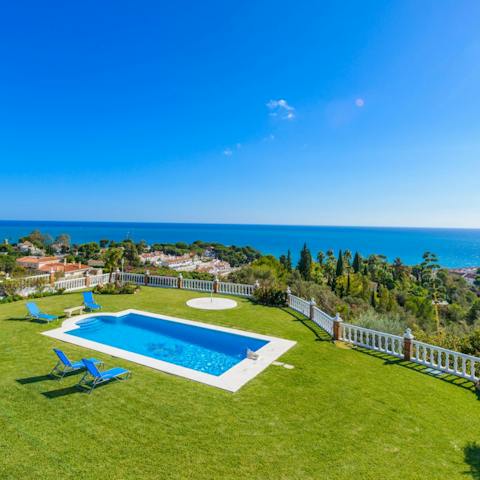 Enjoy beautiful views across Benalmádena whilst relaxing by the pool