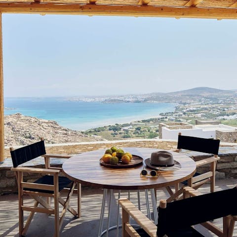 Dine alfresco while taking in spectacular views of the Aegean Sea 