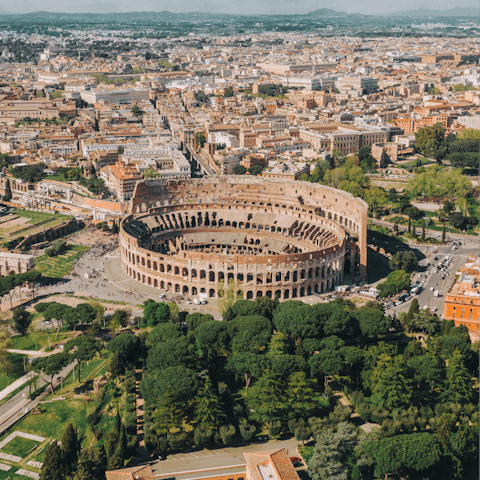 Walk just 300 metres to the architectural wonder of the Colosseum