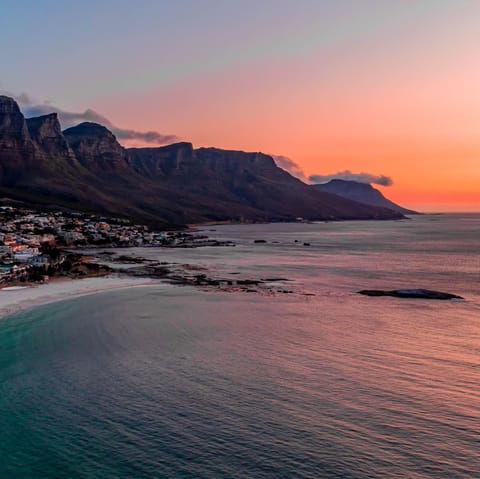 Watch the sun set over spectacular Camps Bay
