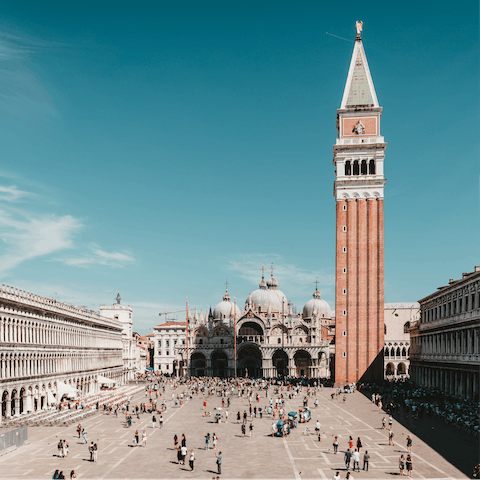 Hop on a water taxi down to the vibrant St Mark's Square