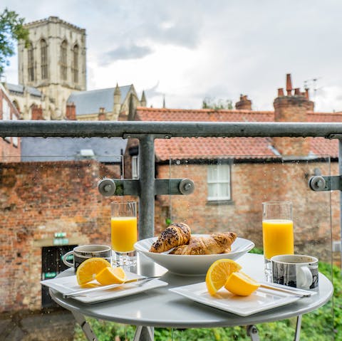 Enjoy breakfast on the balcony with a view of York Minster