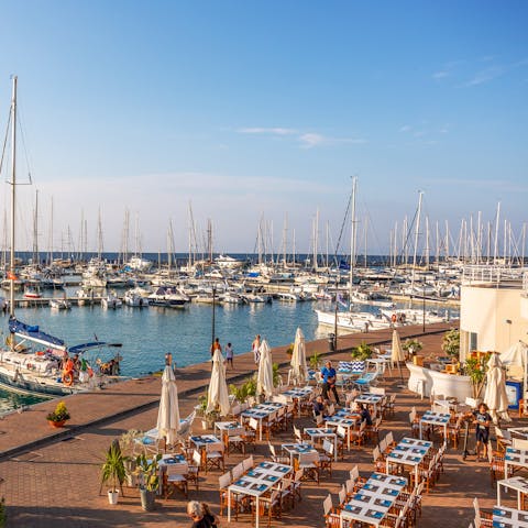 Head down to Capo d’Orlando’s nearby marina for a sunset meal
