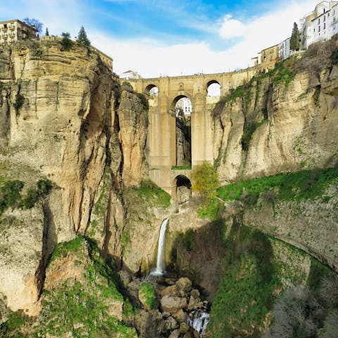 Cross the bridge over the El Tajo gorge which separates Ronda's old and new towns