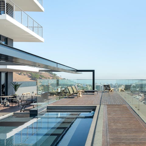 Cool off from the South African sun in the shared pool on the 27th-floor roof terrace