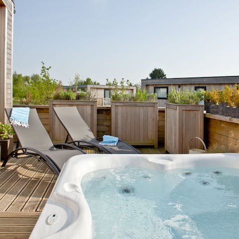 Sip a glass of bubbly in the Jacuzzi as the sun starts to set