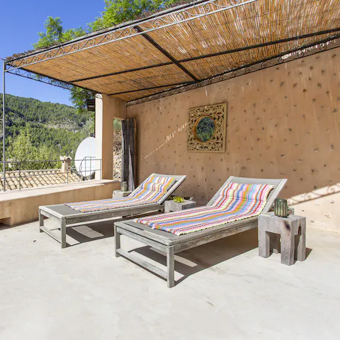 Soak up the sun on the master bedroom's private terrace