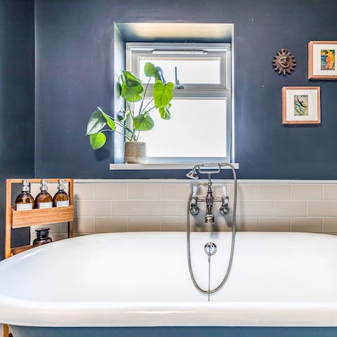 Unwind with a relaxing bubble bath in the clawfoot tub 