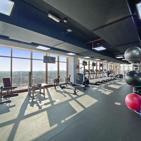 Start your day with a panoramic-viewed workout session in the gym 