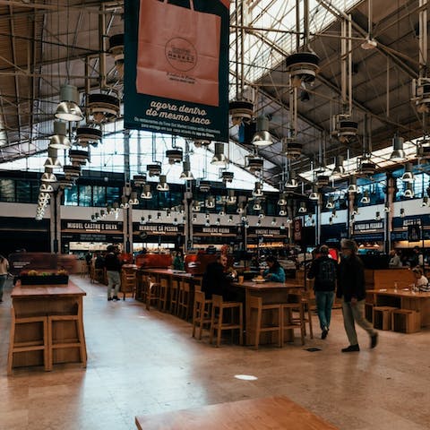 Enjoy dinner at the famous Time Out Market, reached in twenty-five minutes by metro