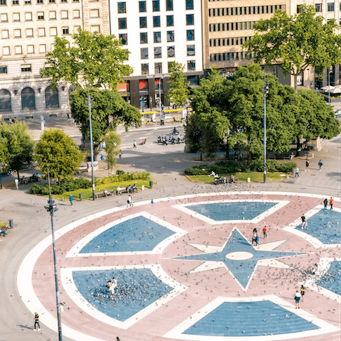 Take a thirteen-minute stroll to Plaça de Catalunya