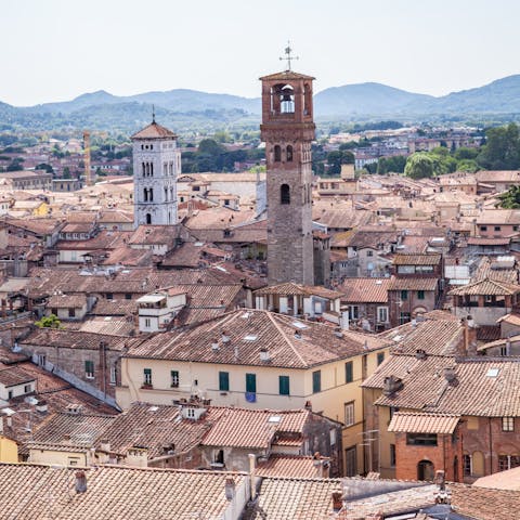 Take a short drive over to Lucca and explore its cobbled streets