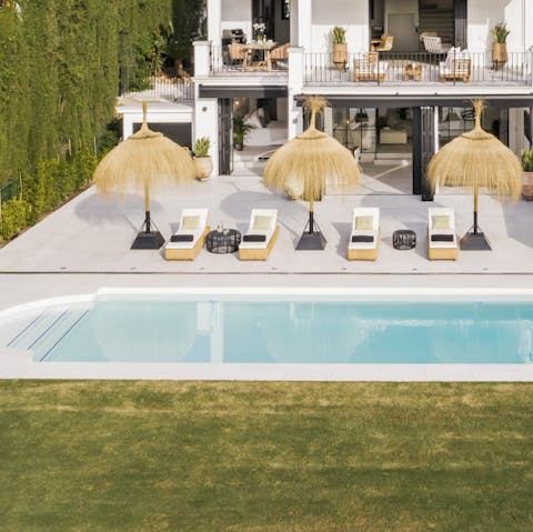 Lay out by the pool on a comfy sun lounger or swim laps in its cool waters