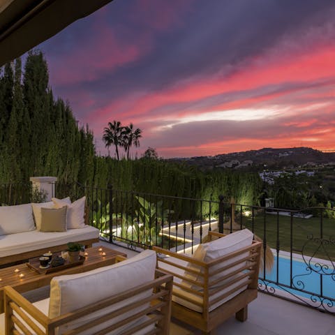 Enjoy cocktails on the patio with views of sumptuous sunsets