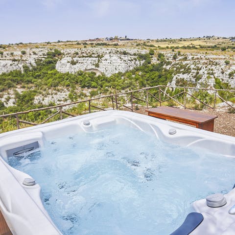 Have a soak in the Jacuzzi  – complete with incredible views