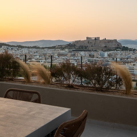 Whip up a Greek salad in the shared outdoor kitchen on the communal roof terrace and then take in the Athens vistas