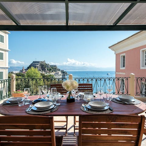 Look out at gorgeous sea views as you dine alfresco on Greek salads