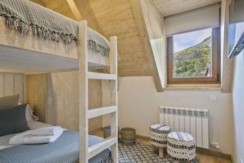 Wake up to heavenly hillside views through these lovely wooden windows