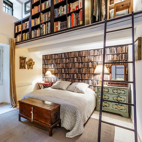 Discover the library of books in the master bedroom