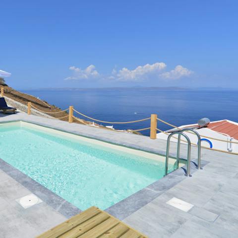 Go for a dip in the private pool with the backdrop of the Aegean sea