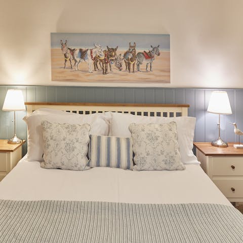 Sleep well in the large king-size bed after all that sea air