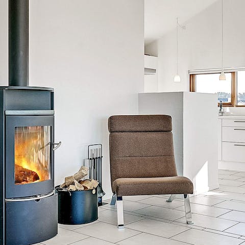 Warm up by the fire on wintery evenings, curling up with a book on the comfortable sofa