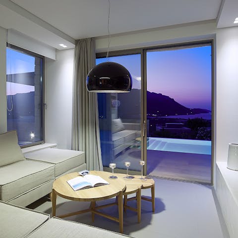 Enjoy dramatic sunsets and panoramic views out of the huge windows