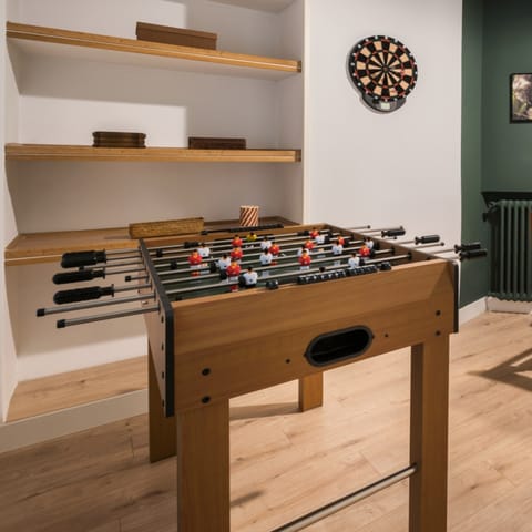 Challenge friends or family to a game of table football 