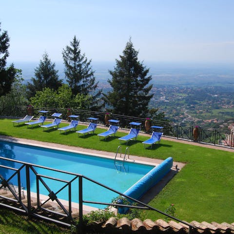 Take in the views of the surrounding medieval villages from the poolside