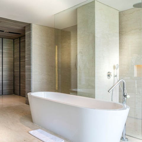 Treat yourself to a rejuvenating session in the freestanding bathtub