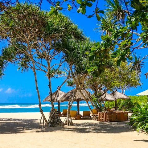 Pop over to one of Bali's plentiful beaches, including Pandawa only thirteen minutes' drive away