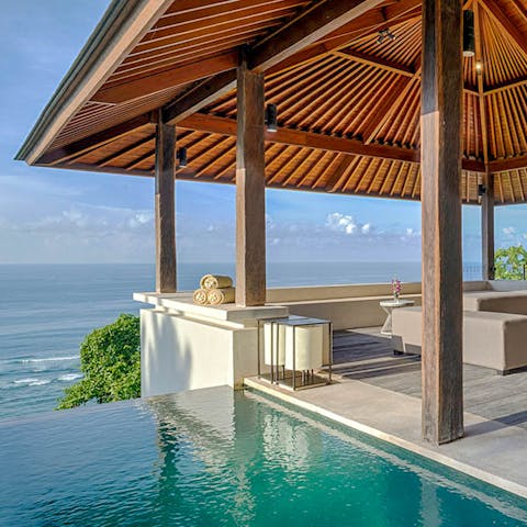 Float about elegantly in the infinity swimming pool and gaze out at the Indian Ocean